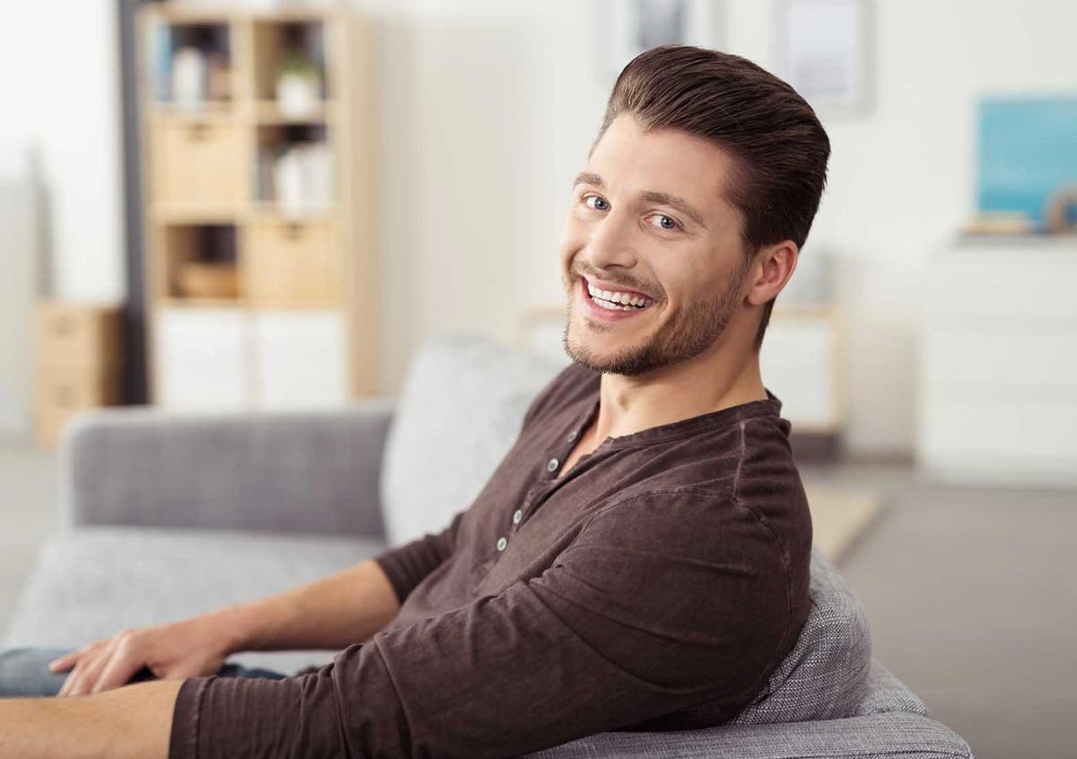 A man sitting on the couch
