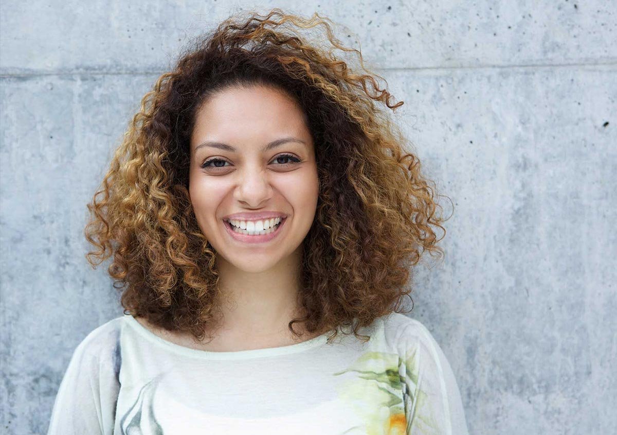 A woman with curly hair