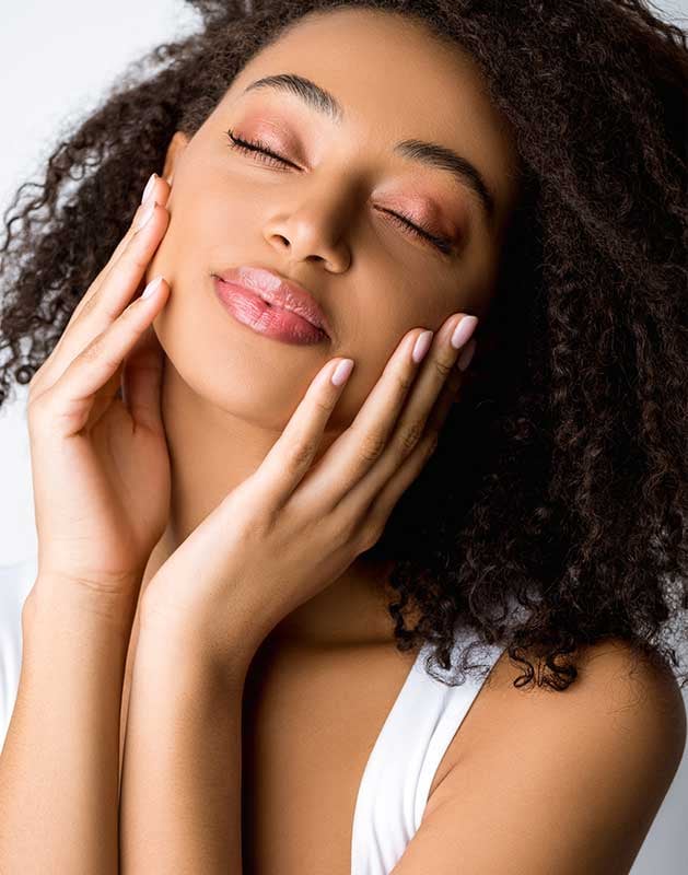 Portrait of beautiful african american girl with closed eyes, isolated on grey