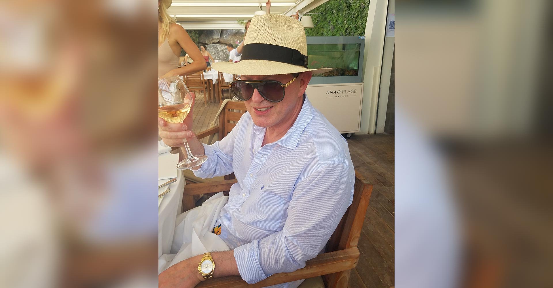 Dr. Kirwan with a glass