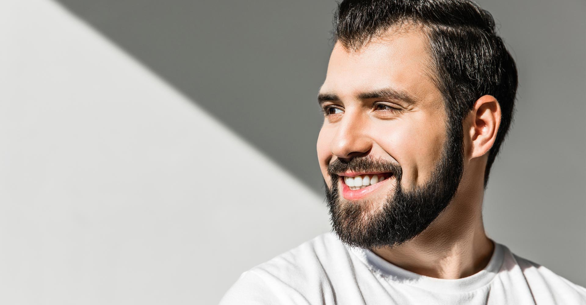 Smiling bearded man
