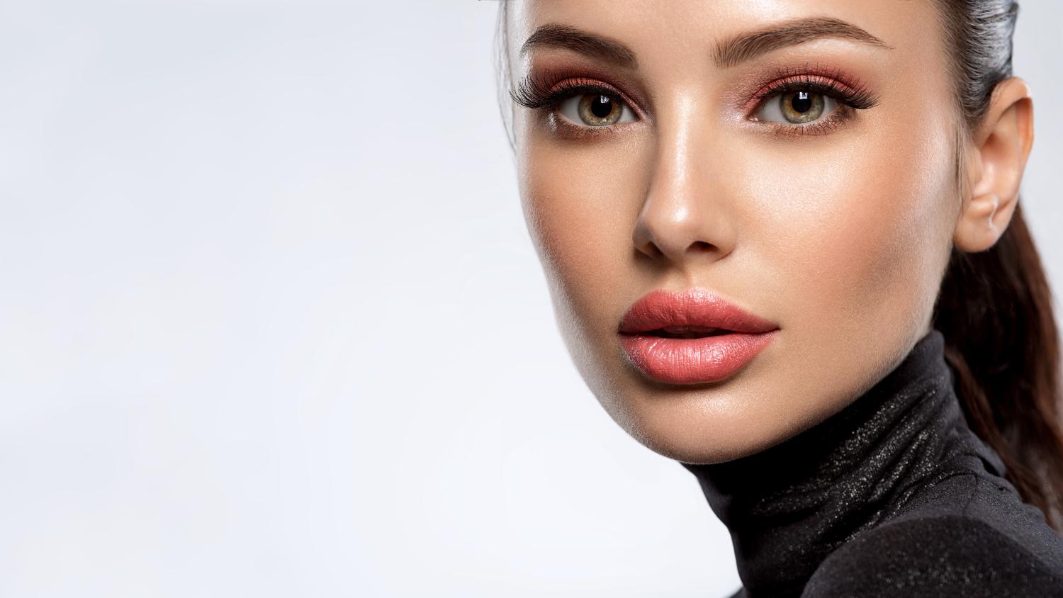 Beauty portrait of a woman with bold makeup