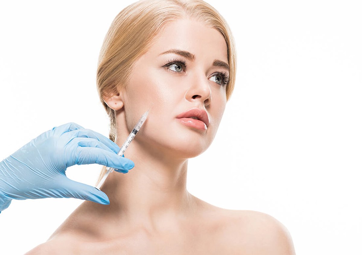 Close-up of Botox injection near the jawline for facial slimming and masseter muscle contouring in Norwalk, CT